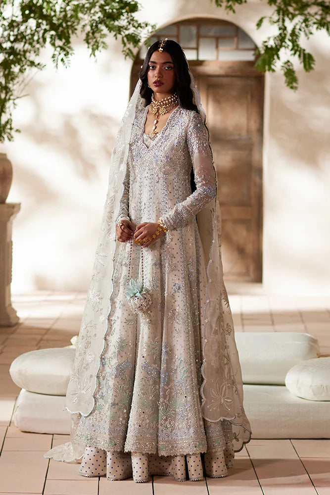 Suffuse Yasmira off white organza shirt and silk lehenga