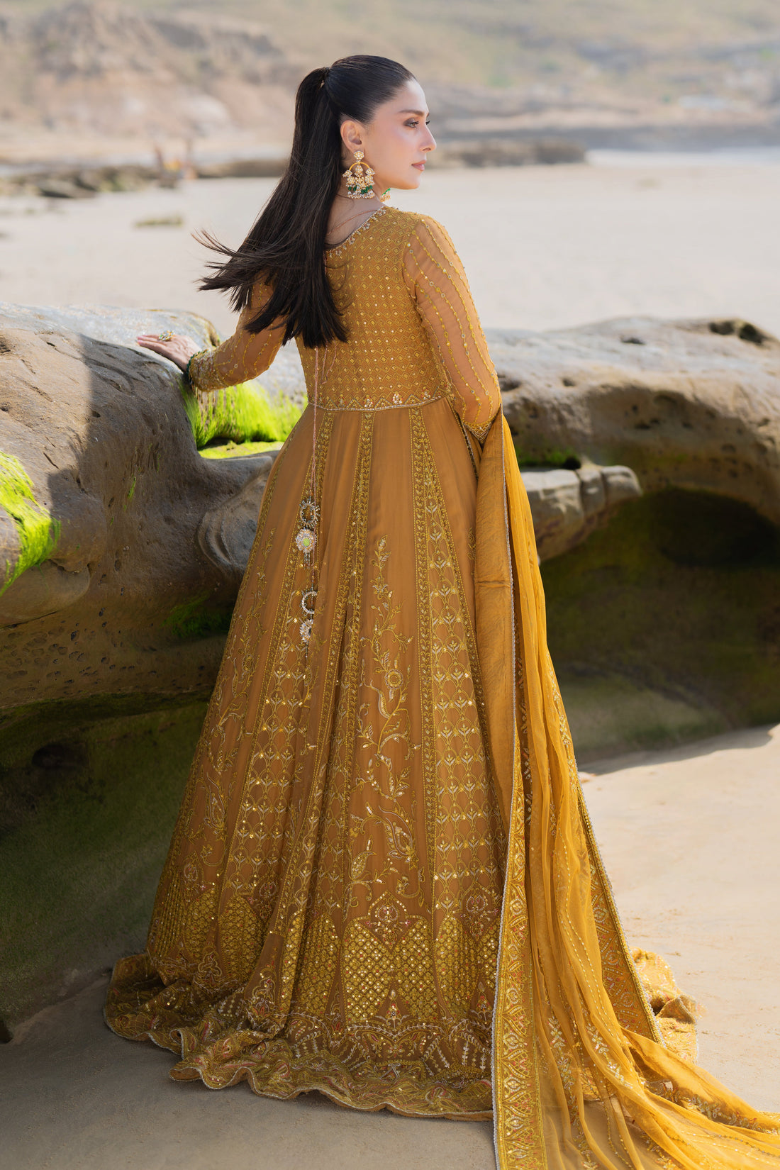 NAQSHI Ainara mustard crinkle frock front featuring round neckline with keyhole, heavily hand‑adda embellished bodice and sleeves, straight cutline over plain pants.