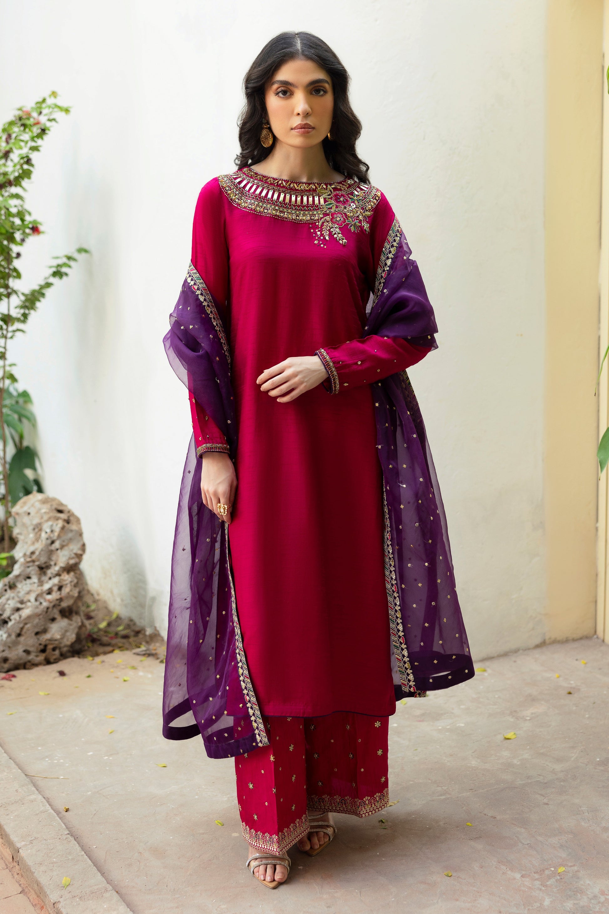 NAQSHI Raima culottes front shot showing heavy sequin and embroidered borders with delicate contrasting thread texture on raw silk.