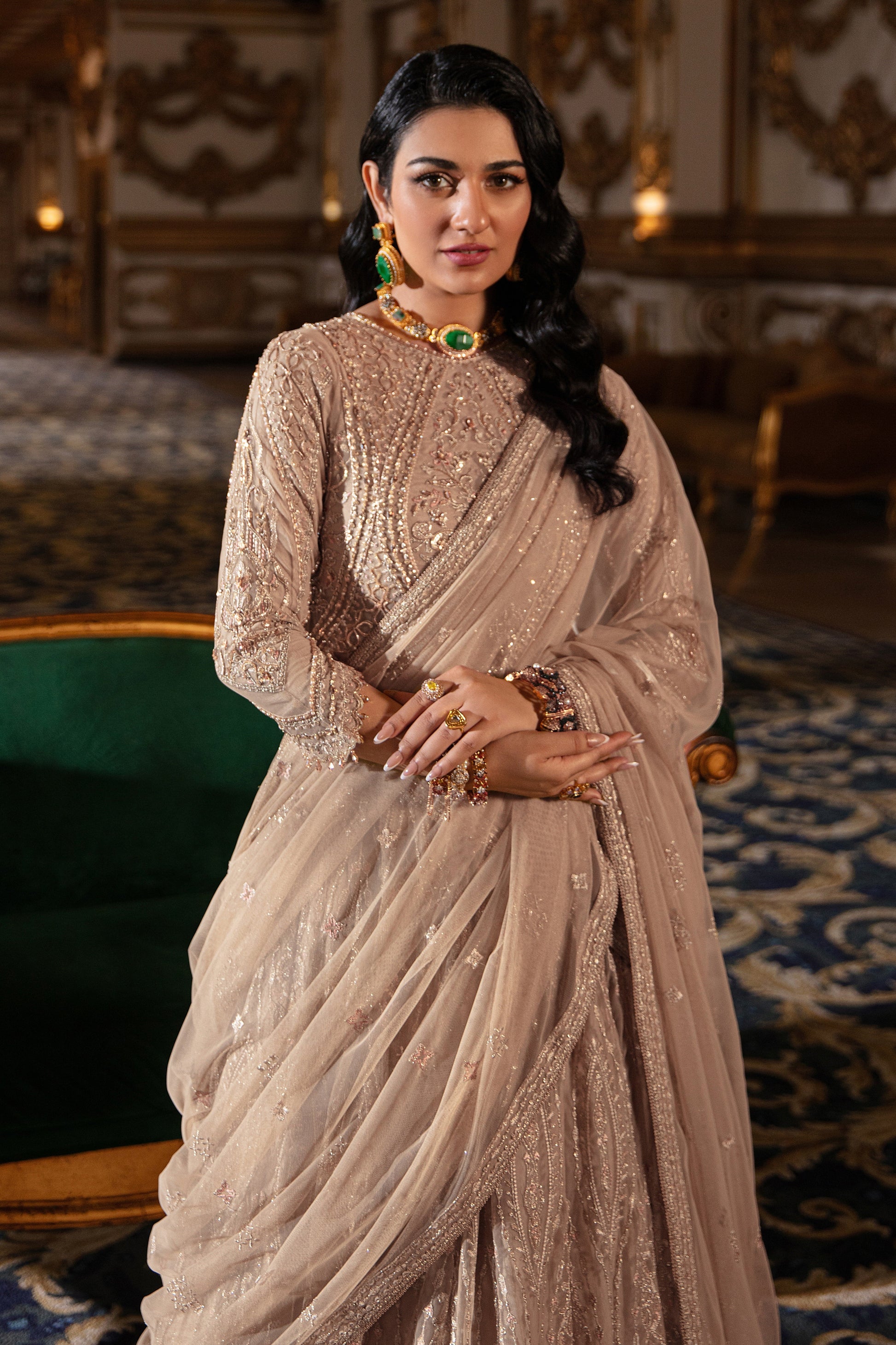 Macro shot focusing on Areeza’s scalloped sleeve edge with delicate lace, sequin hangings and hand-embroidered net finish.