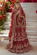 Full standing look of Jhankar garnet red lehenga frock suit with heavy borders and layered flare, complete formal bridal barat attire.