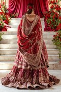 Back view of Jhankar garnet red bridal outfit showing wide kalidar frock flare, lehenga volume and long dupatta fall, traditional ready made barat wedding dress.