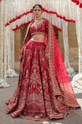 Full standing pose of Qurbat fuchsia red wedding dress showing wide lehenga flare and long dupatta fall, traditional ready made bridal attire.