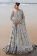 NAQSHI Valeria silver net maxi frock with floor‑length cutline, near‑neck neckline, heavily hand‑adda embellished bodice and sleeves, dense sequin embroidery and contrasting lace‑trimmed floral motifs.