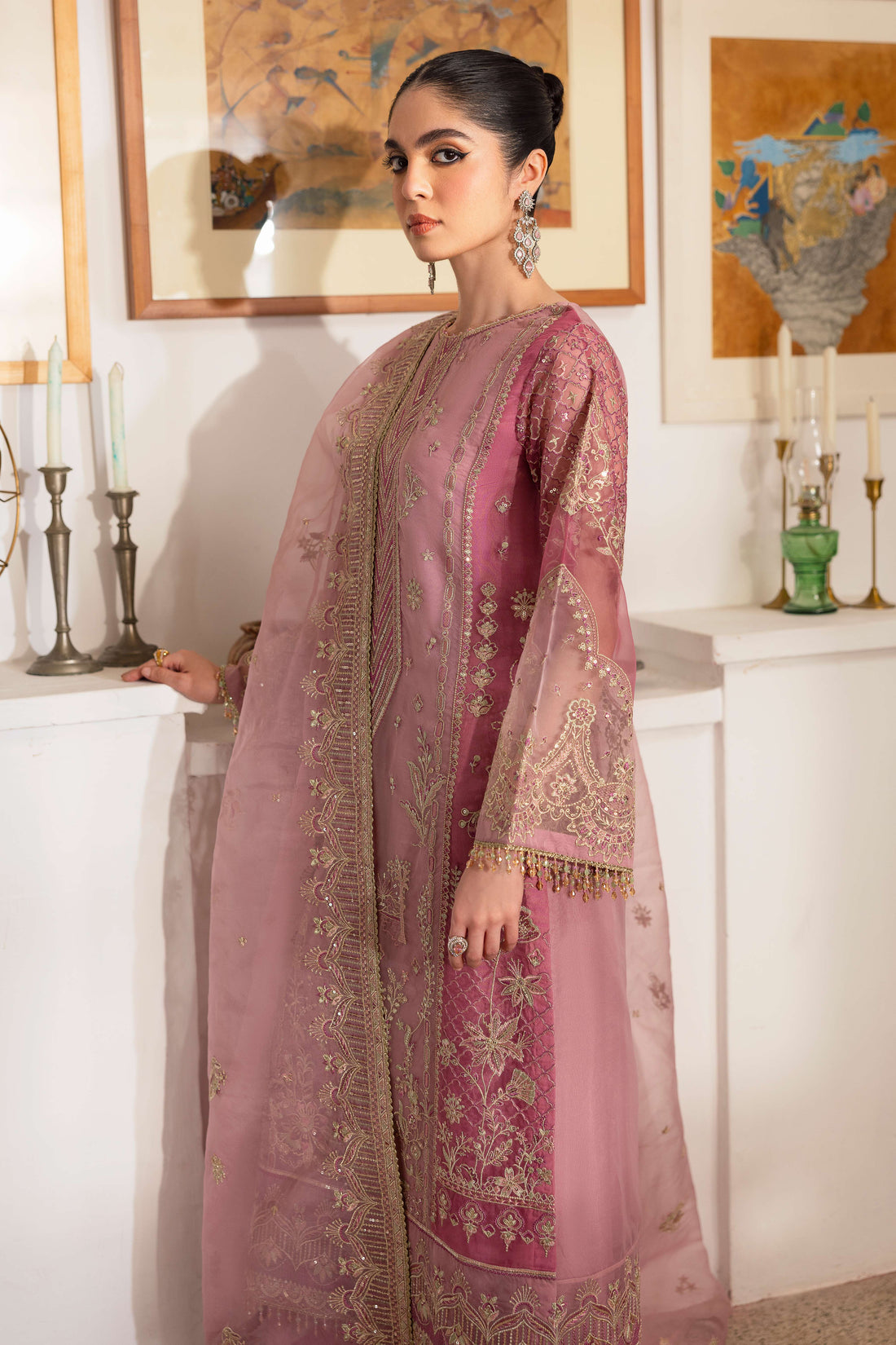 NAQSHI Nayab pastel-pink organza straight-paneled long shirt featuring near-neck geometric embroidery, heavy sequin texture, berry-pink patch panels on sides and sleeves.