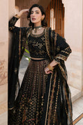 Shot of NAQSHI Kaif lehenga showing contrast texture play with heavy hand‑adda embellishments and rich raw‑silk sheen