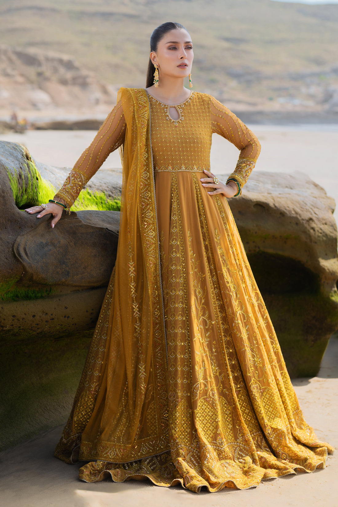 NAQSHI Ainara mustard crinkle frock front featuring round neckline with keyhole, heavily hand‑adda embellished bodice and sleeves, straight cutline over plain pants.
