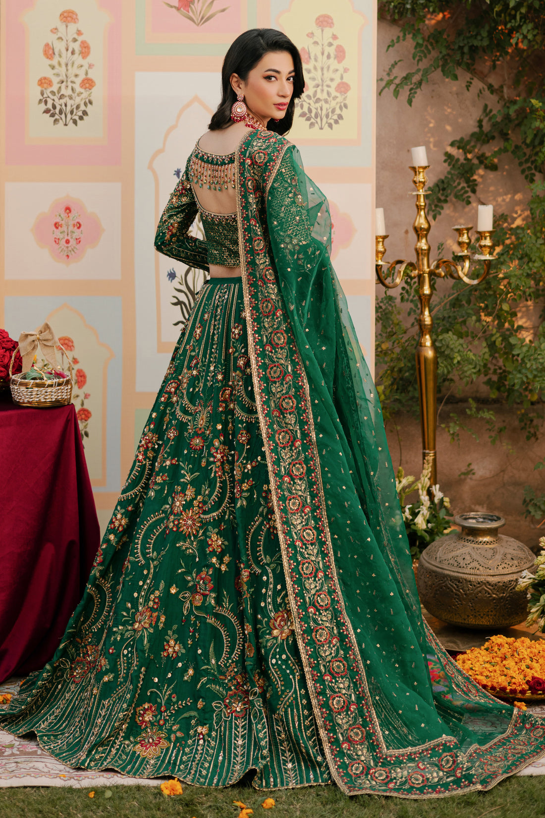 NAQSHI Danir festive green raw‑silk lehenga choli showing round neckline adorned with heavy sequin and hand‑adda embroidery featuring kora, dabka, stones, sitara, crystals and threadwork.