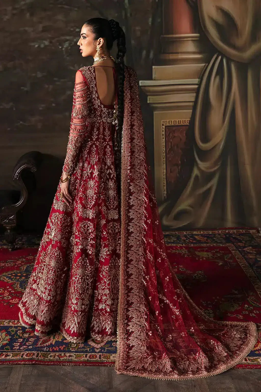 Afrozeh The Brides Edit 23 Adelaide bridal dress in brick red with heavy gold embroidery, full sleeves, and matching dupatta, front view.