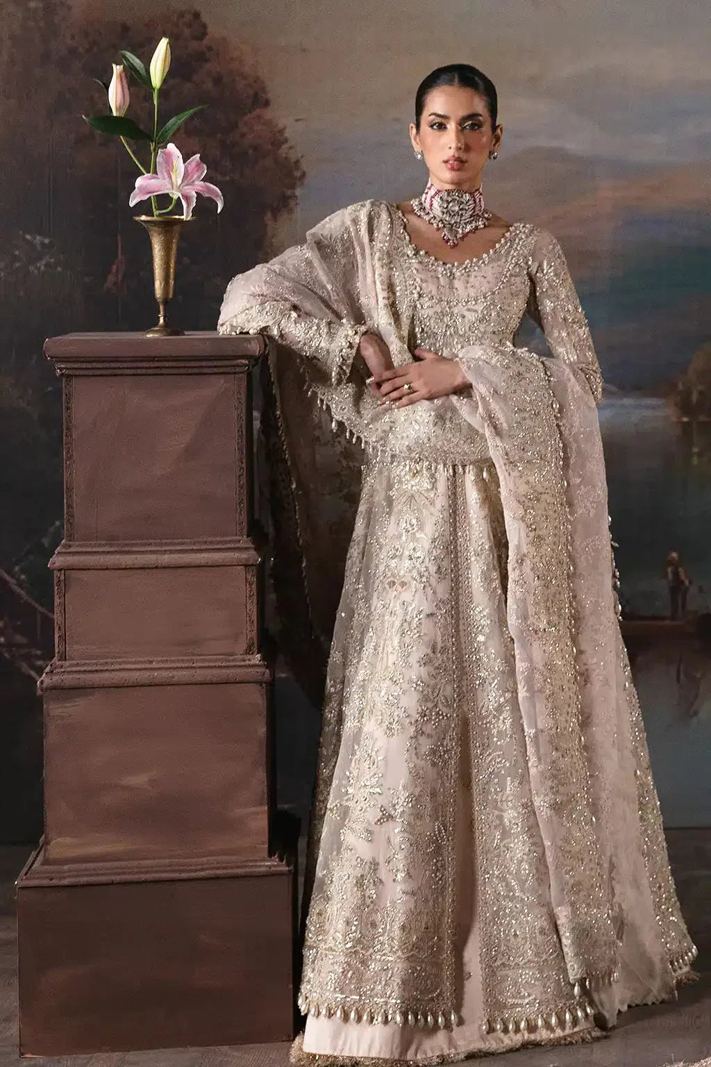 Afrozeh The Brides Edit 23 Clara bridal dress in baby pink organza with intricate gold embroidery, long peshwas and lehnga design.
