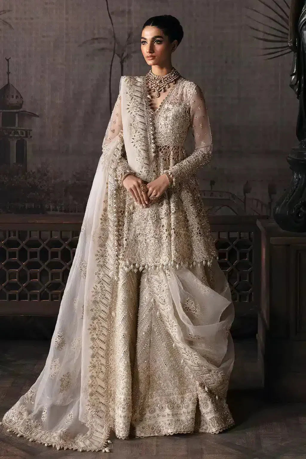Afrozeh The Brides Edit 23 Helena bridal outfit featuring an off-white organza short shirt with intricate embroidery and matching plazo.