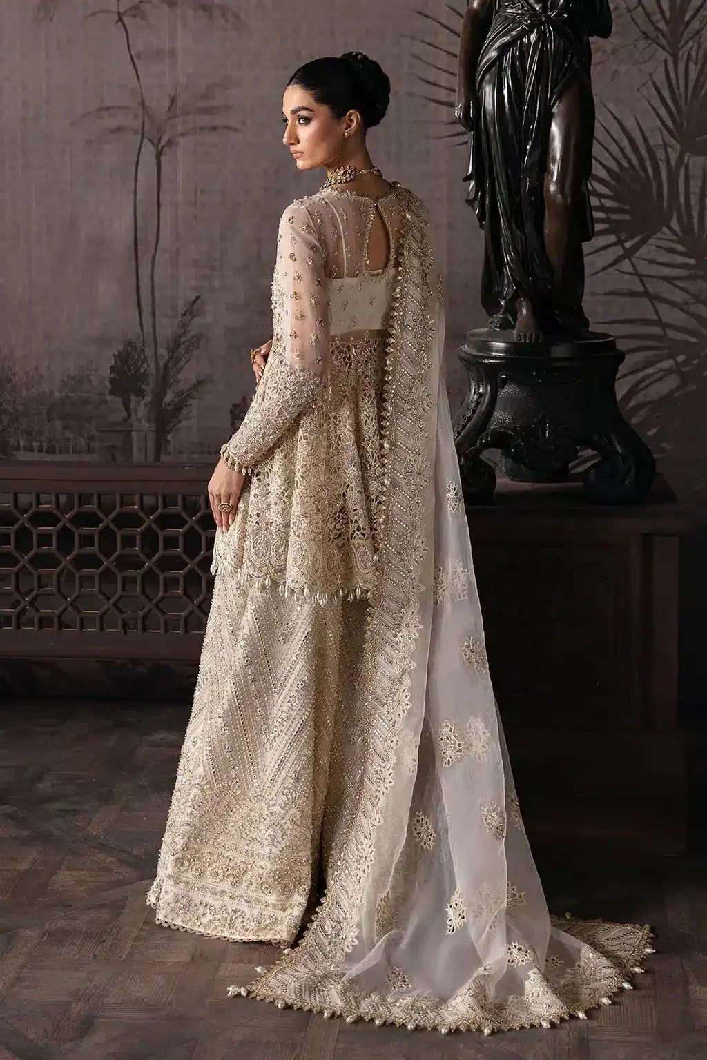 Afrozeh The Brides Edit 23 Helena bridal outfit featuring an off-white organza short shirt with intricate embroidery and matching plazo.