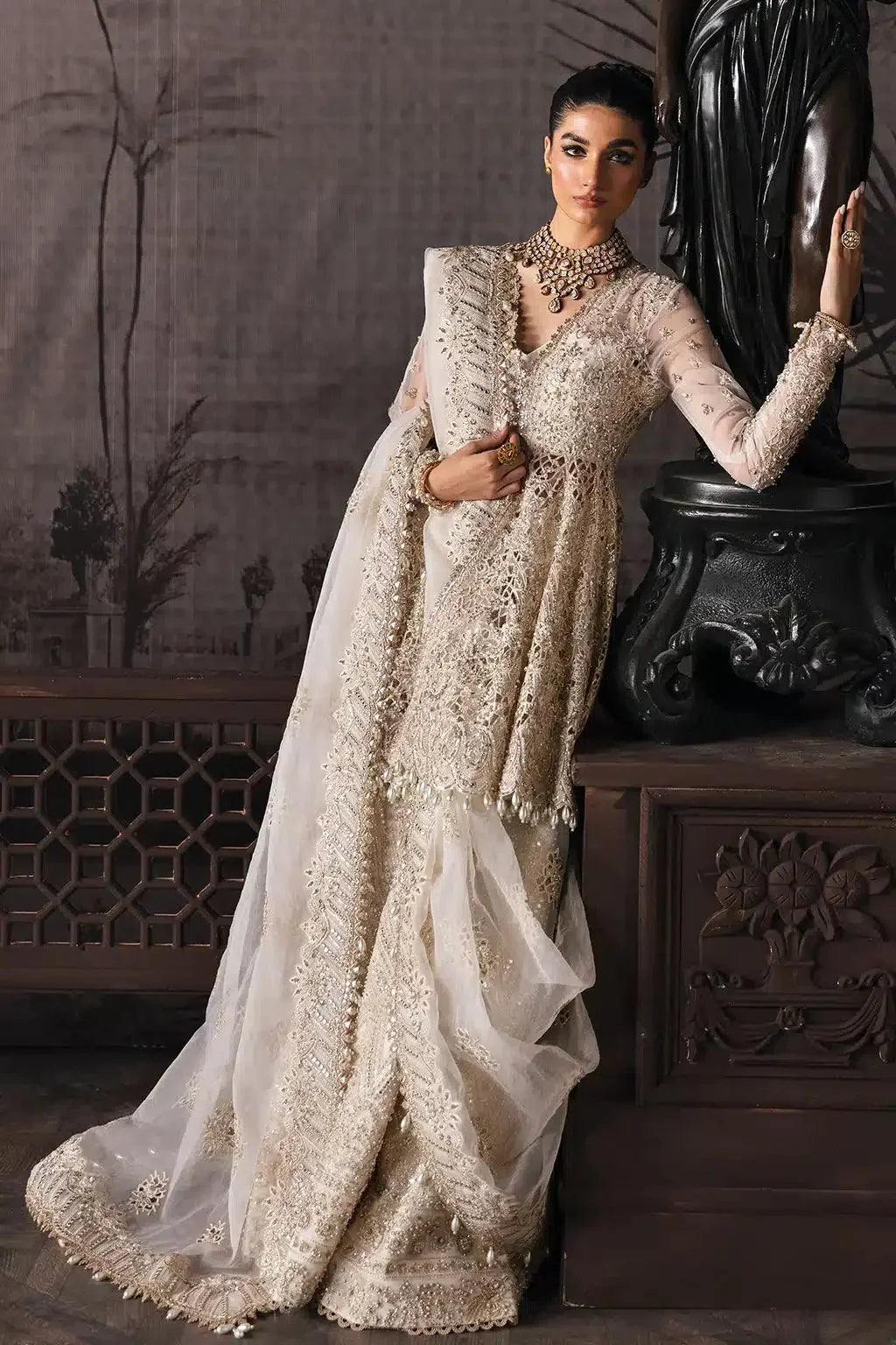 Elegant Afrozeh Helena bridal ensemble from The Brides Edit 23, showcasing detailed beadwork on organza shirt and flared plazo pants.