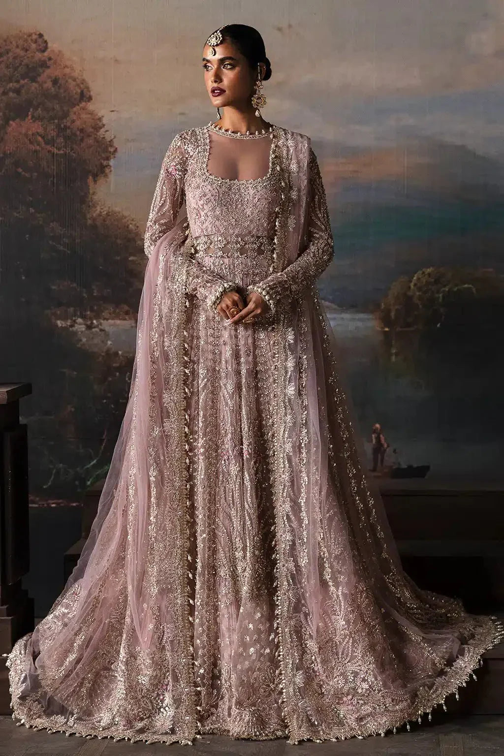 Afrozeh The Brides Edit 23 Isabella bridal dress in lilac net with intricate embroidery, full sleeves, and flared maxi silhouette.