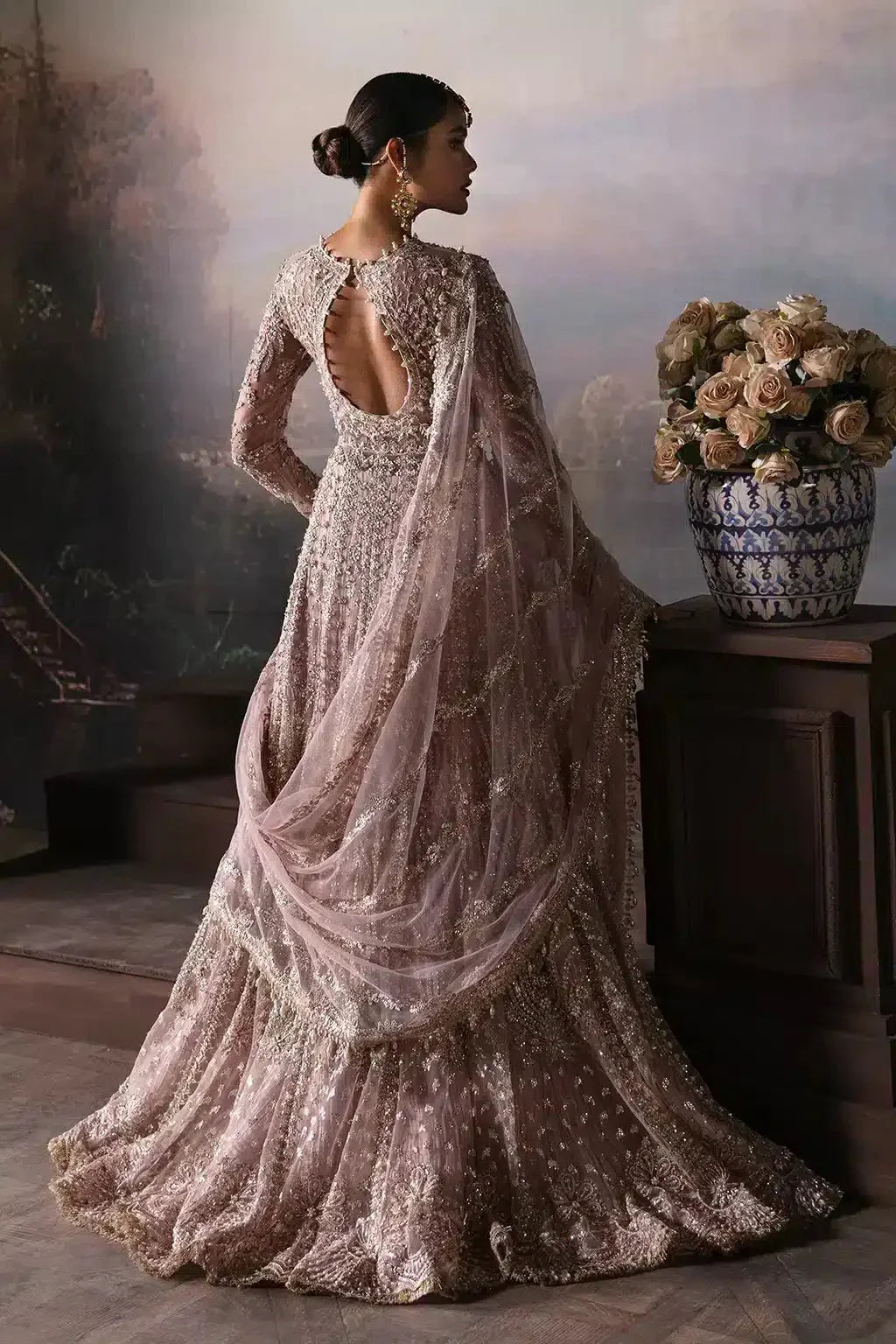 Afrozeh The Brides Edit 23 Isabella bridal dress in lilac net with intricate embroidery, full sleeves, and flared maxi silhouette.