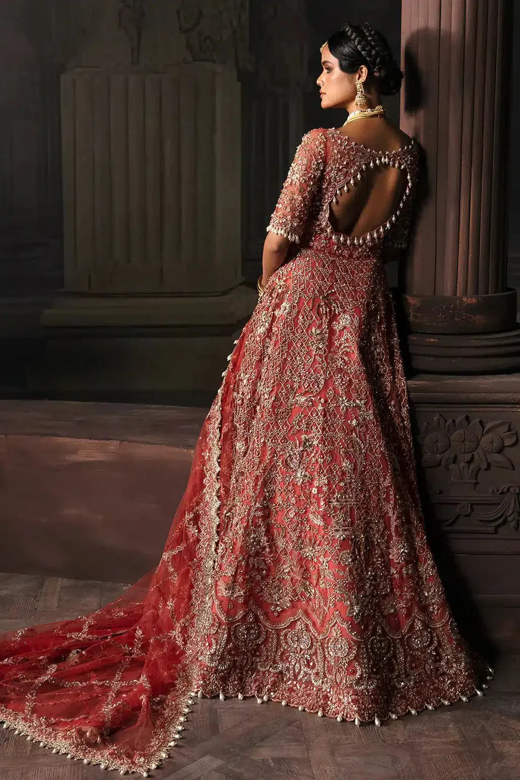 Afrozeh The Brides Edit 23 Lavinia bridal dress in rust net fabric with intricate embroidery and open back design, perfect for weddings.