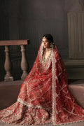 Bridal dress Lavinia by Afrozeh from The Brides Edit 23 in rust net, showcasing detailed embroidery and elegant bridal styling.