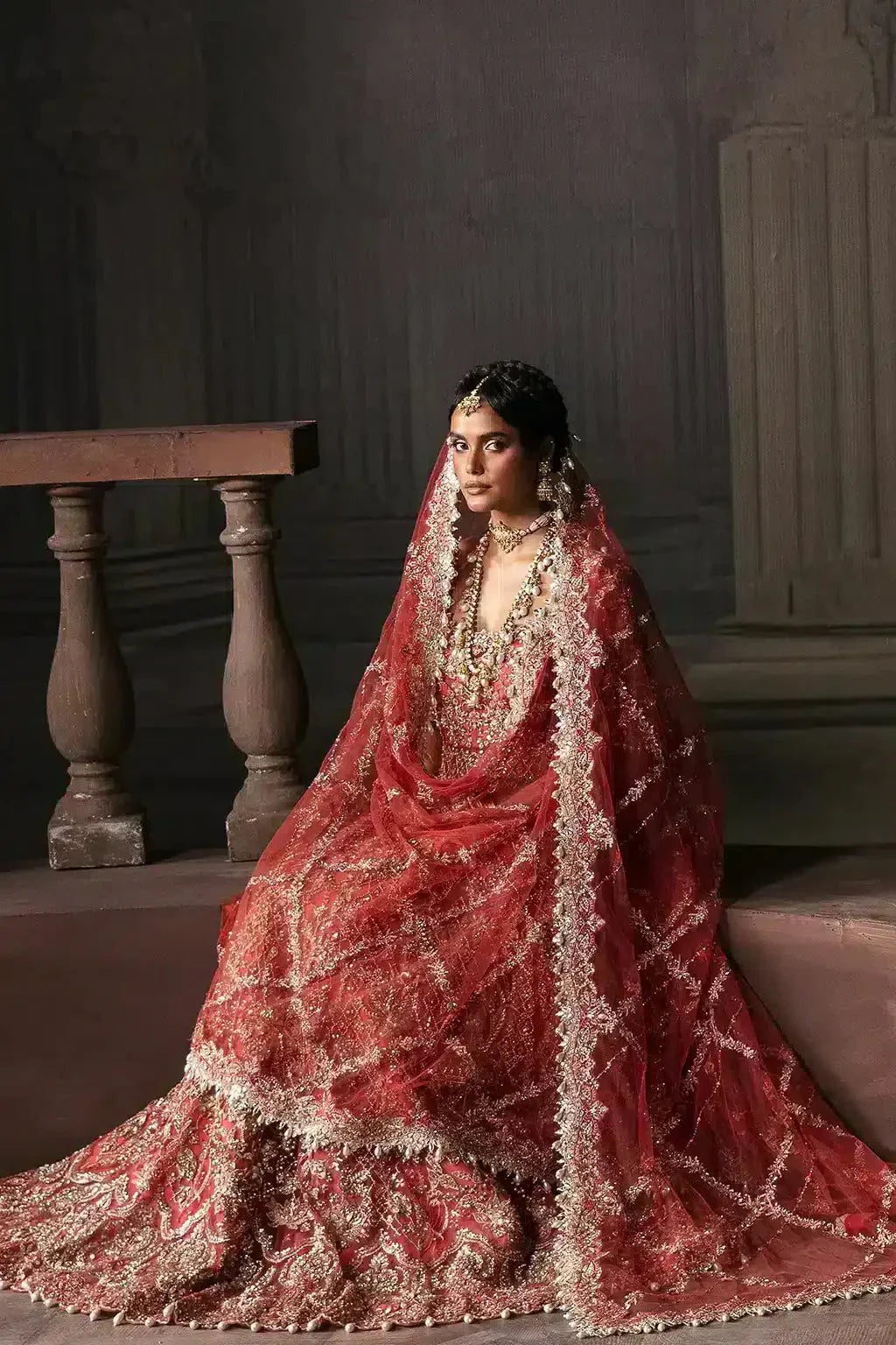 Bridal dress Lavinia by Afrozeh from The Brides Edit 23 in rust net, showcasing detailed embroidery and elegant bridal styling.