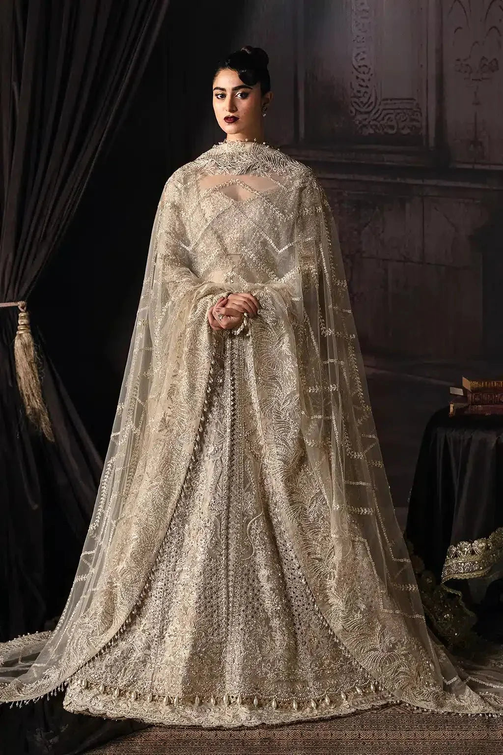 Front view of Afrozeh Margaret bridal dress with sheer embroidered dupatta draped over shoulders, highlighting regal craftsmanship.