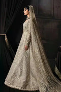 Side profile of Afrozeh The Brides Edit 23 Margaret bridal outfit featuring full-length gold embroidery and flowing dupatta.