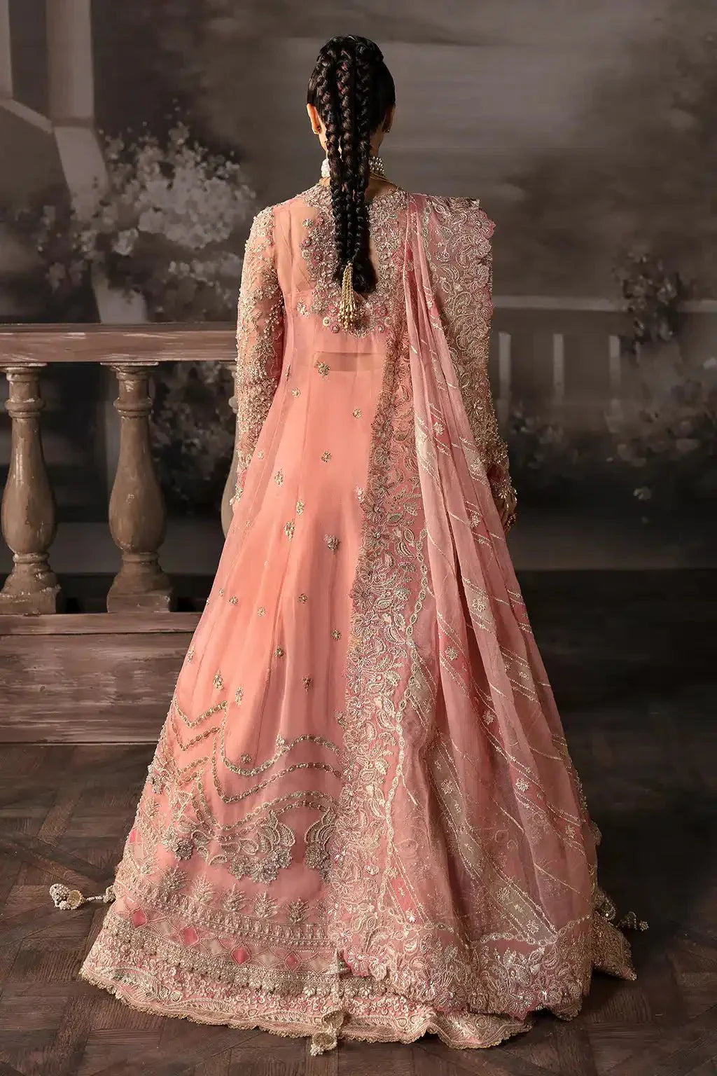 Afrozeh The Brides Edit 23 Victoria bridal dress in tea pink organza, featuring intricate gold embroidery and a slit peshwas with lehnga.