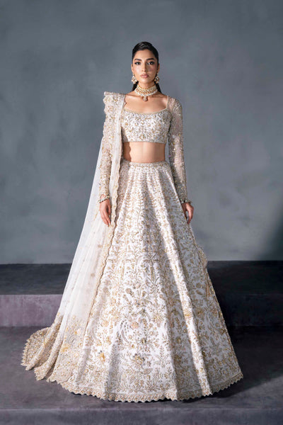 Akbar Aslam Lurve white and gold bridal lehenga choli