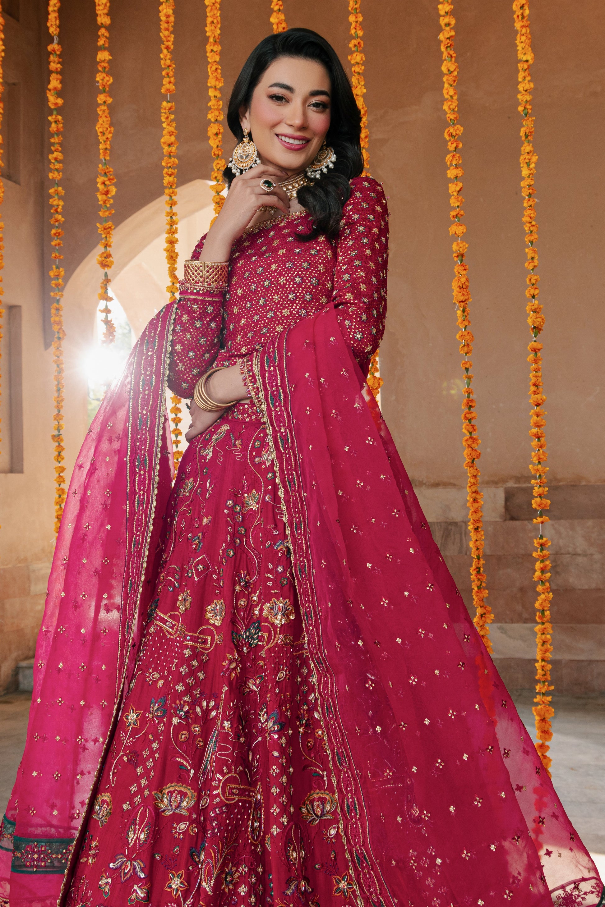 NAQSHI Nageen embroidered organza dupatta draped to showcase heavy pallu border with applique, mini motif spray and multi‑tone embroidered trims