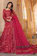 NAQSHI Nageen hot‑pink raw‑silk lehenga choli with boat neckline, heavy sequin embroidery on front bodice, lush floral motifs on lehenga and matching embellished organza dupatta