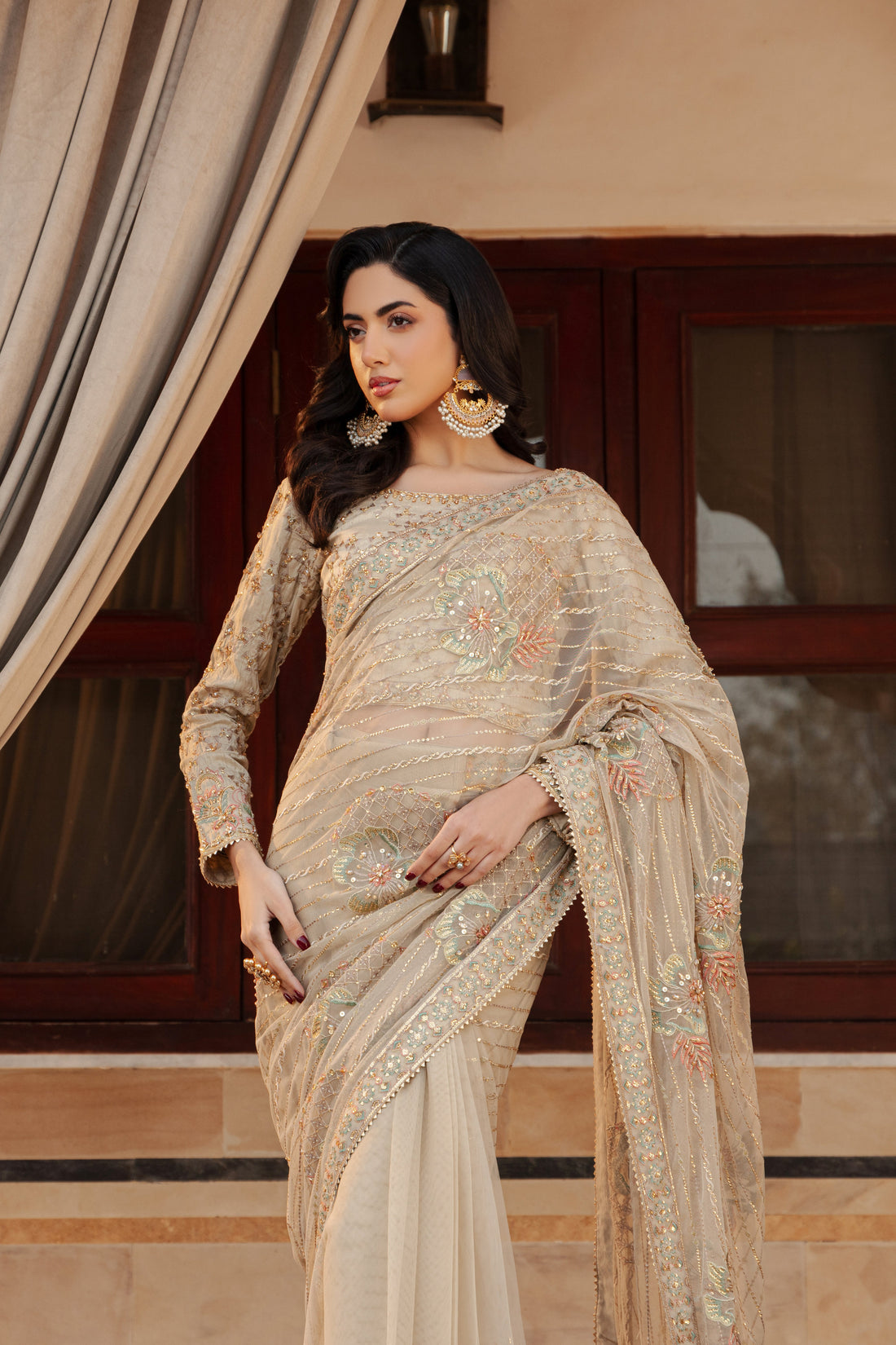 Close‑up of NAQSHI Ramish blouse boat neckline adorned with hand‑embroidered kora, dabka, sitara, stones, crystals and threadwork