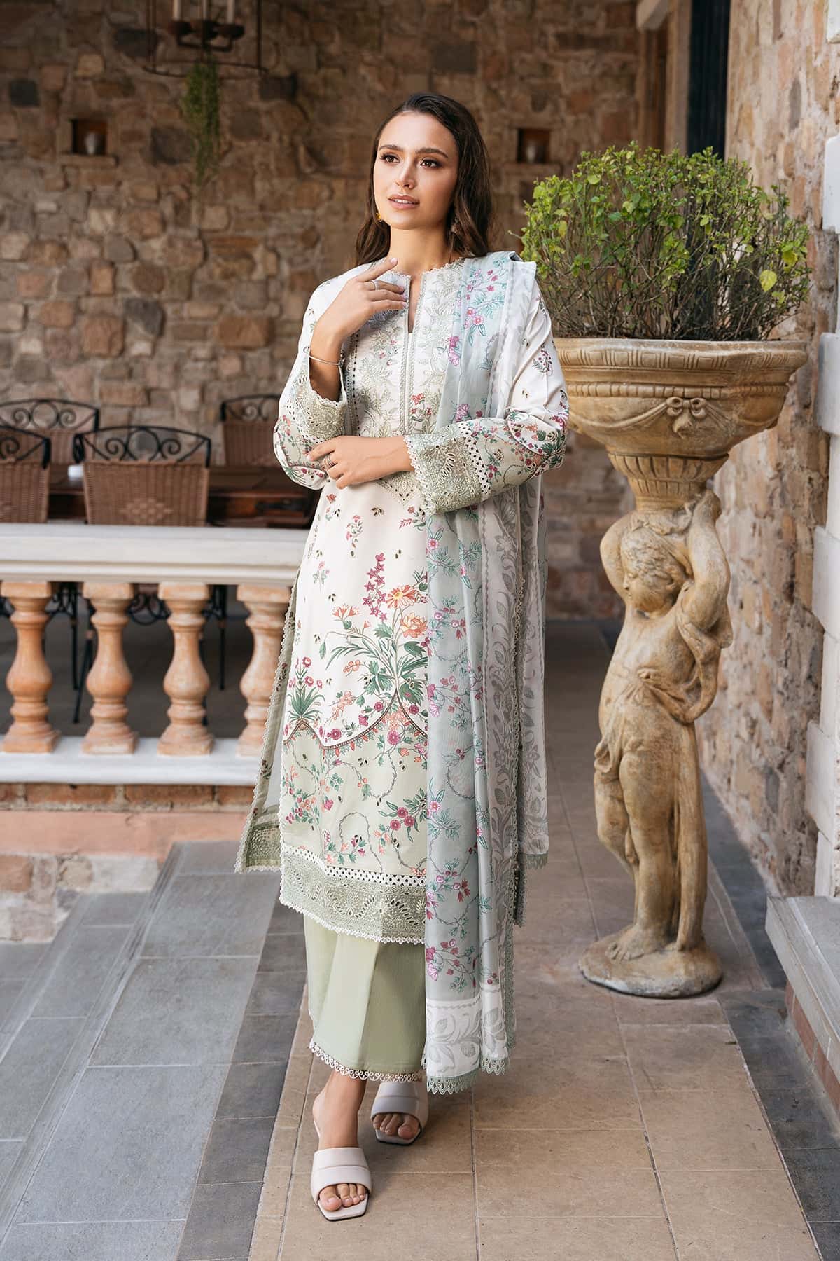 Afrozeh Rosheen A light green embroidered lawn suit